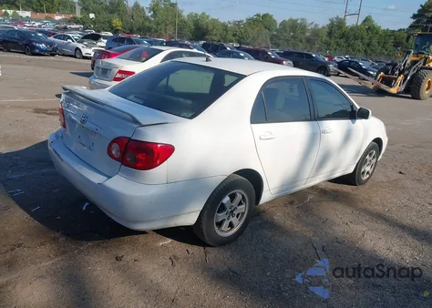 2004 Toyota Corolla Le z USA, uszkodzony, nr VIN JTDBR32EX42044932